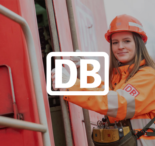 DB - woman in orange high vis jacket and a hard hat