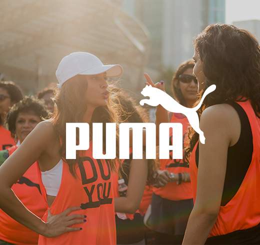 Puma - women wearing orange bibs